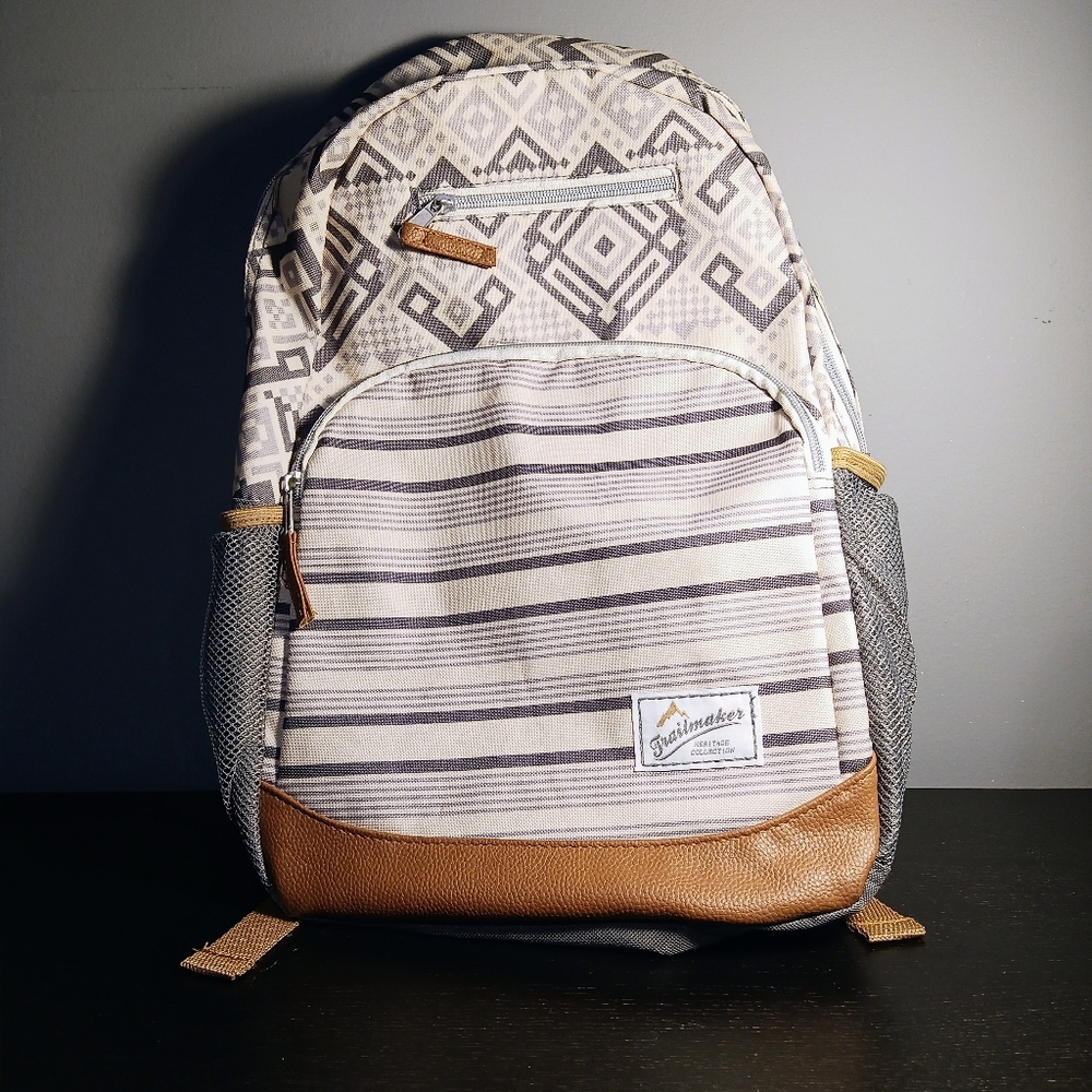 Trailmaker Heritage Collection gray and tan backpack with leather details